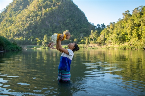 Motherhood around the world as seen through the lens of nine female humanitarian photographers.